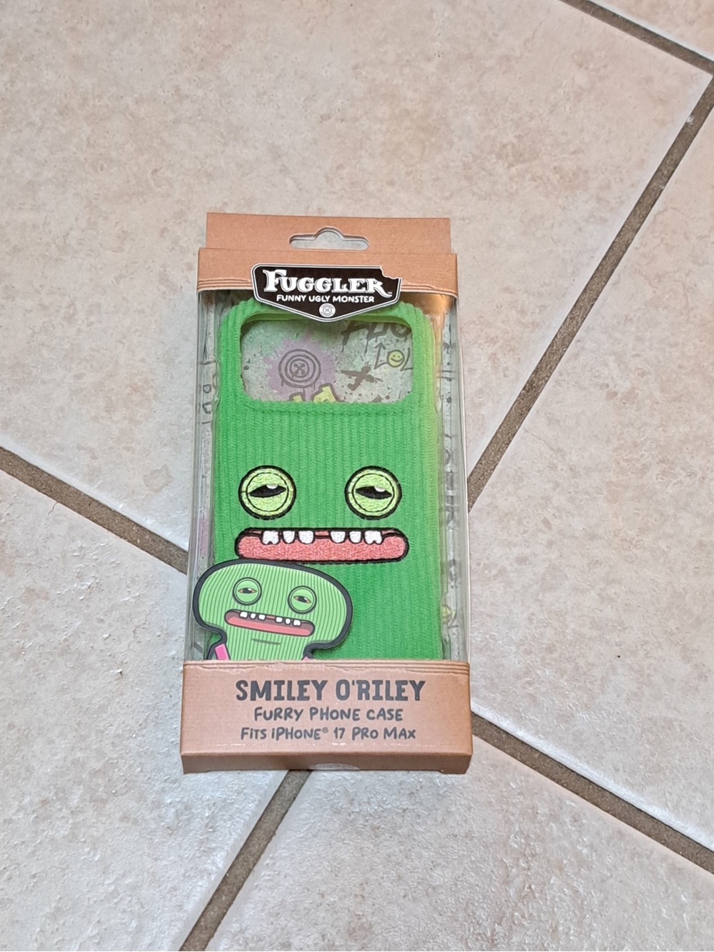 Fuggler Furry iPhone 17 Pro Max Phone Case - green featuring the Smiley O'Riley